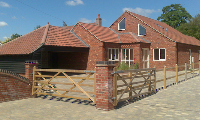 Roofer in Norwich completing tiled roof repairs