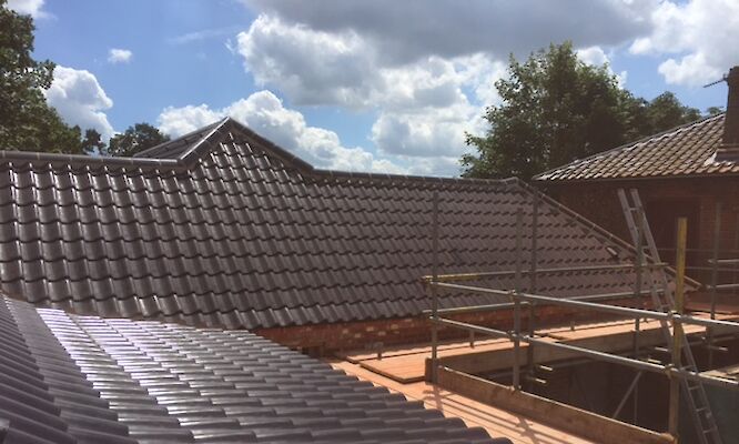 N&T Brown Roofing, Mattishall, Black Tiled Roofing Norfolk
