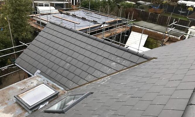 Roofer Norfolk completing roof repair in Hingham