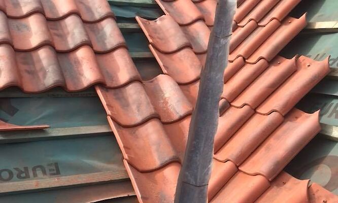 Roofer Norfolk working on property in Bintree